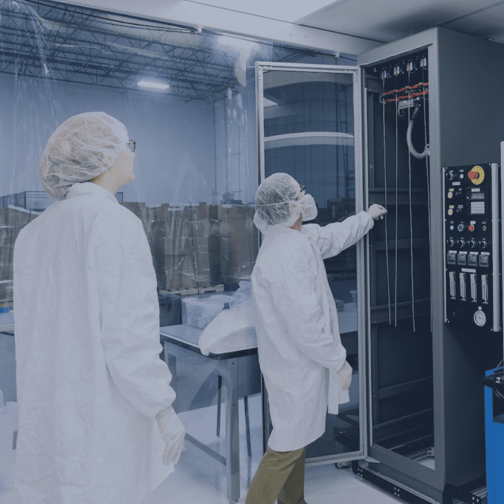 Technicians in clean room testing device prototypes