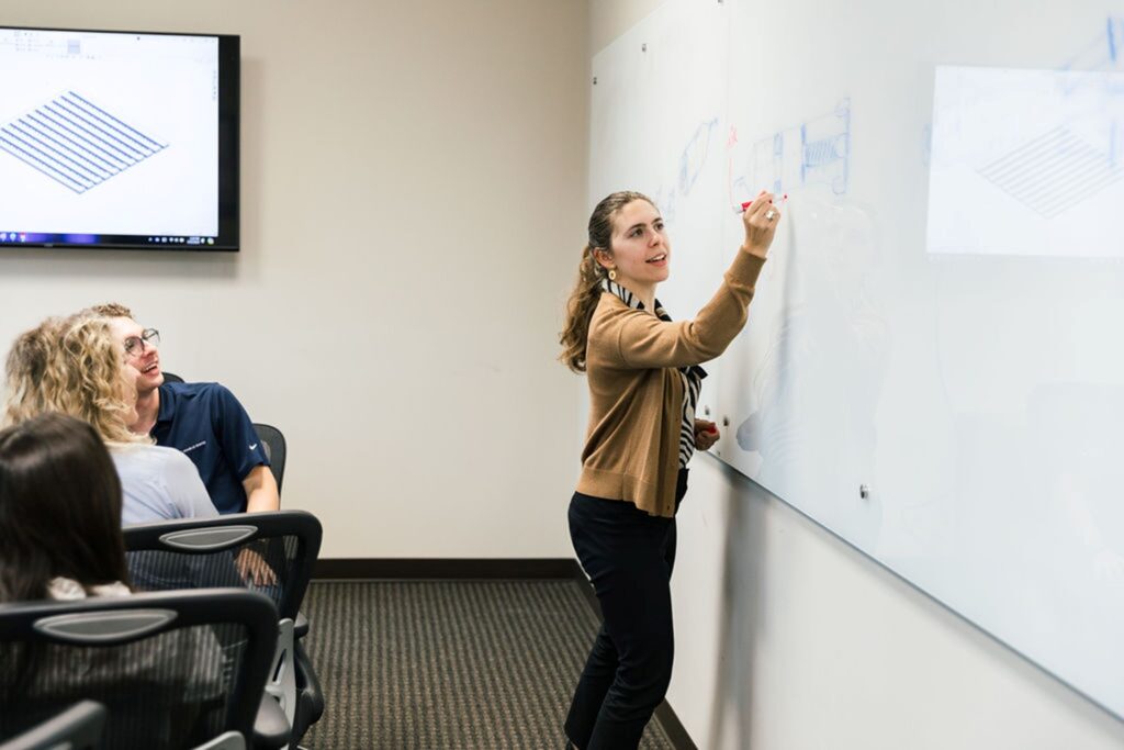 Medical Murray staff discuss manufacturing processes