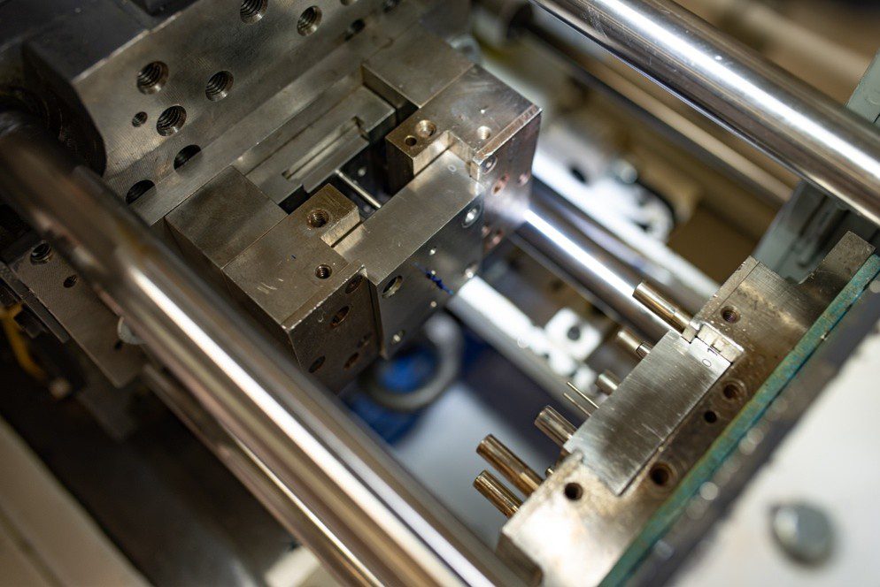 Machinery used in micro insert molding process for medical devices