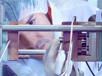 Medical device manufacturing technician fabricating device