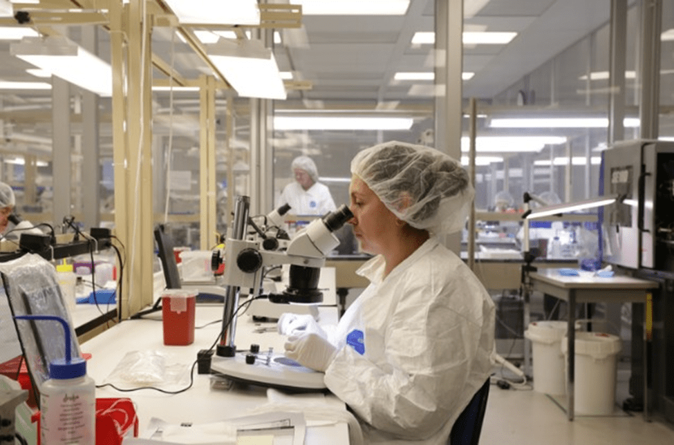 Medical Murray technicians examining medical device