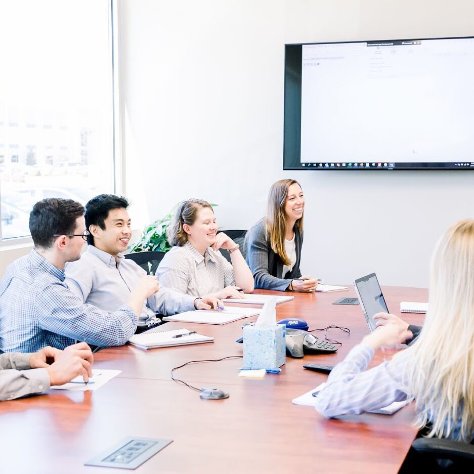 Medical Murray staff in discussion around conference table