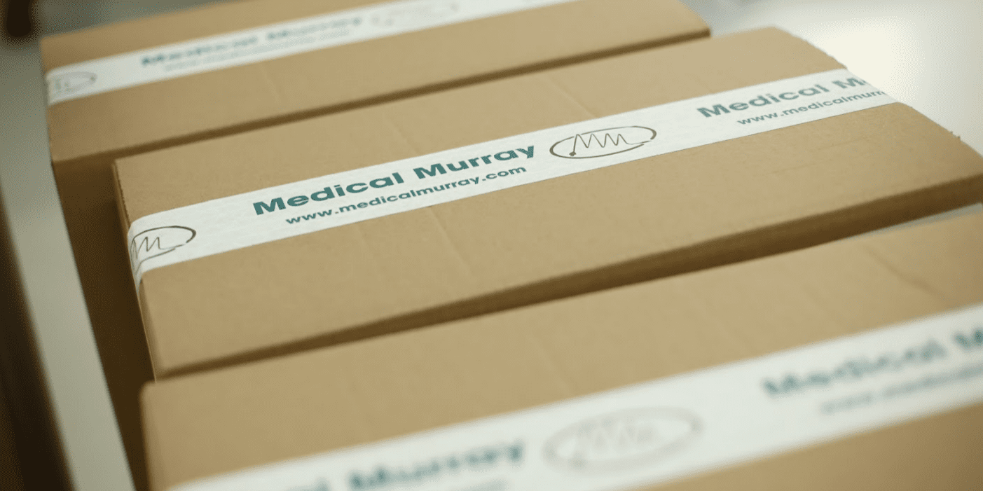 Medical devices packed in boxes for shipping with Medical Murray logo